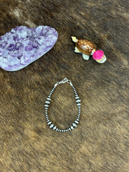 7.5" 3-8MM Rondell Sterling Pearl Bracelet